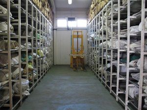 ICMP's Podrinje Identification Project (PIP) was formed to deal with the identification primarily of victims of 1995 Srebrenica massacre. PIP includes a facility for storing, processing, and handling exhumed remains. Much of the remains are only fragments or commingled body fragments since they were recovered from secondary mass graves. The photo depicts one section of the refrigerated mortuary.